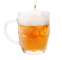 Pouring a pint of beer, isolated on white.