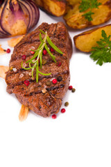 Grilled steak on wood