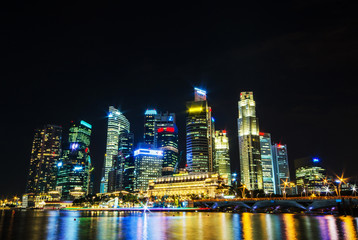 Plakat Singapore city skyline view of business district in the night ti