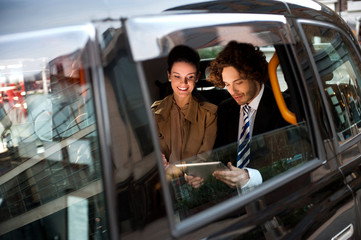 Business people in taxi cab