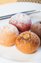 round donuts with flavored fillings
