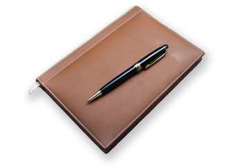 old book with pen on wood white background