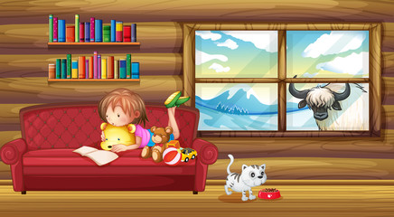 A little girl reading a book