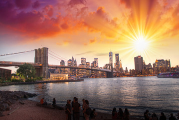 New York City. Wonderful sunset view of Brooklyn Bridge and Manh