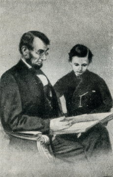Abraham Lincoln with his youngest son, Tad (1864)