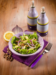 salad with avocado lettuce beans and onions