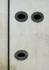 Oval stone windows like face - architectural detail