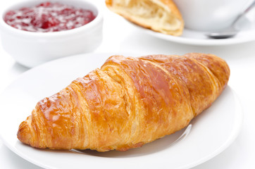fresh croissant on a plate for breakfast