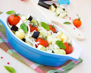 Mixed vegetable in blue bowl for baked in the oven
