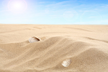 Sand with copy space and blue sky – summer product display or vacation concept. Minimalist summer...