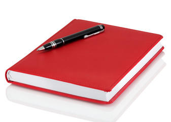 Leather notebook and pen isolated on the white
