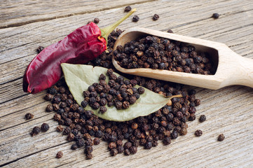 Black pepper, pod chili and bay leaf