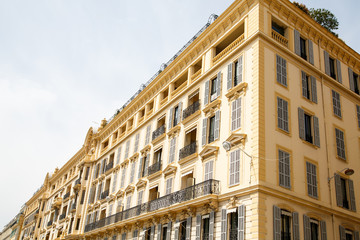 Fototapeta na wymiar Large Yellow Building in Nice
