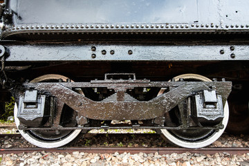 Fototapeta na wymiar Detail of the wheels on a steam train