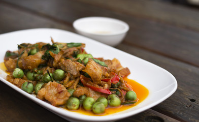 Thai food, Pork, Spicy Boar mixed with spices on plate
