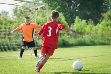Foto op Plexiglas kids' soccer © Dusan Kostic