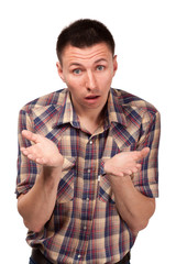 Bewildered man in plaid shirt