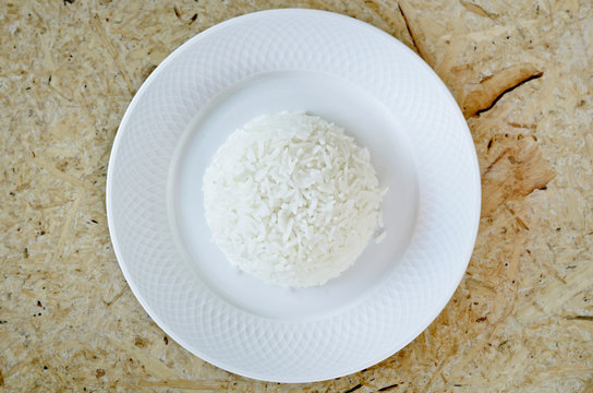 Boiled Rice On A White Plate