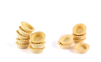 Pile of empty tartlets isolated