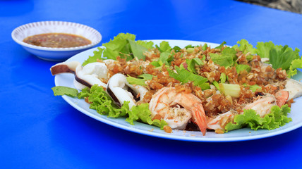 Boiled seafood on white dish