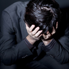Businessmann mit Depression
