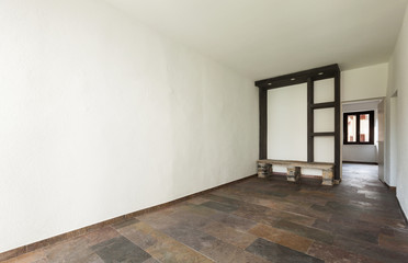 Obraz premium interior old house, empty room with stone floor