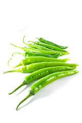 Red and green pepper on a white background