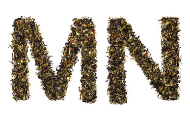 The alphabet from green tea with herbs