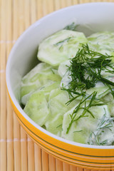 Cucumber salad with sour cream and fresh dill