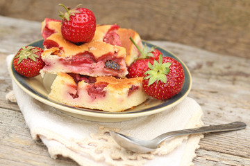 Fresh baked Strawberry Cake on wooden background