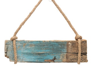 Old wooden board with rope