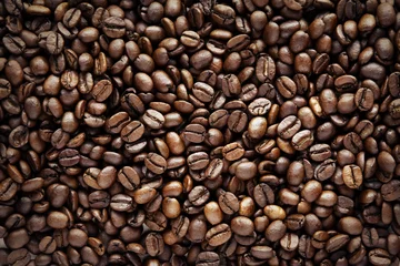 Schließen Sie Nahaufnahme von gerösteten Kaffeebohnen © Stillfx