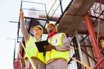 workers working at petrochemical plant