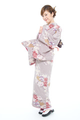 Beautiful japanese kimono woman isolated on white background
