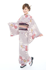 Beautiful japanese kimono woman isolated on white background
