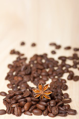 coffee beans on wooden surface background