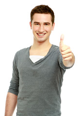 A smiling man showing thumb up sign