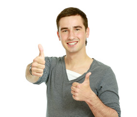 A smiling man showing thumb up sign