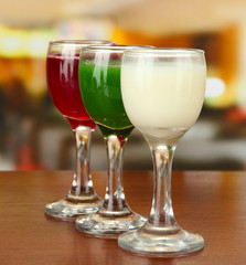 Tasty color liquors, on bright background