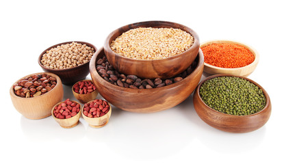 Different kinds of beans in bowls isolated on white