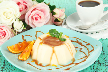 Panna Cotta with orange zest and caramel sauce,