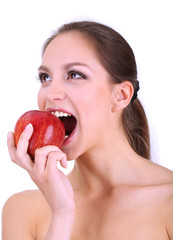 Smiling woman with apple isolated on white