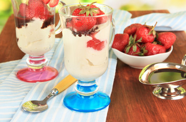 Delicious strawberry desserts in glass vase