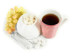 Tea cup and sugar-bowl on white background
