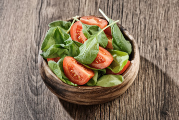 baby spinach salad on a plate
