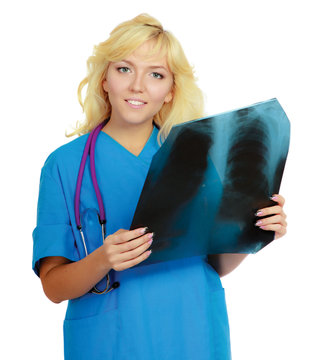 A female doctor examining an X-ray picture