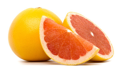 Cut grapefruit isolated on white background