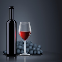 Bottle with red wine with a glass and grapes