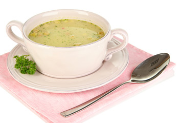 Nourishing soup with vegetables in pan isolated on white
