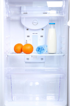 Open refrigerator with diet food